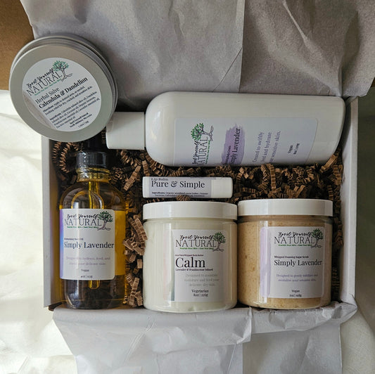 Collection of natural products including bottles, jars, and a box on a white background