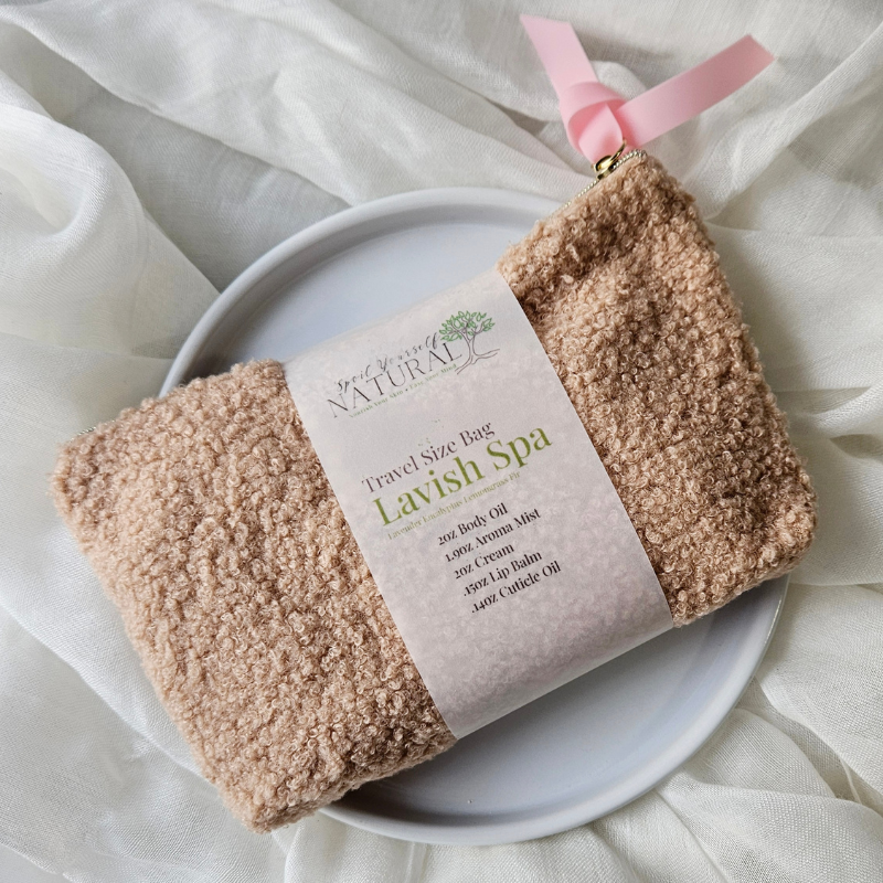 Travel size bag with 'Lavish Spa' products on a white plate