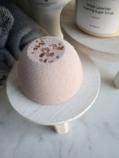 a bath bomb on a wooden round  plate